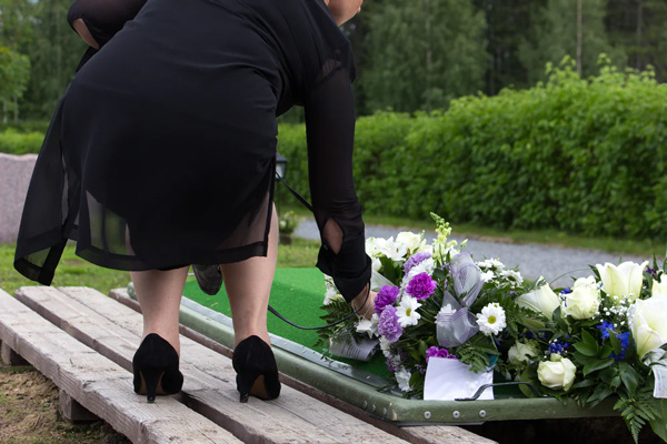 lady at a casket