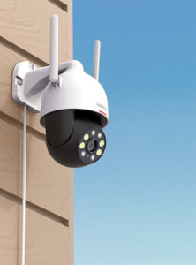 A Detec security camera is mounted to a wall