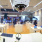 CCTV security panorama with shop store blurry background.